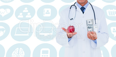 Composite image of male doctor holding red apple and banknote