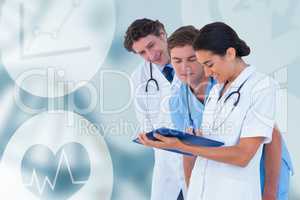 Composite image of happy doctors discussing on white background