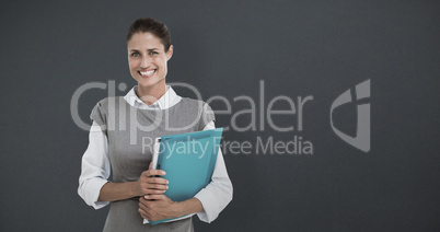 Composite image of portrait of smiling businesswoman holding fil