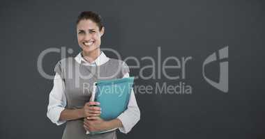 Composite image of portrait of smiling businesswoman holding fil