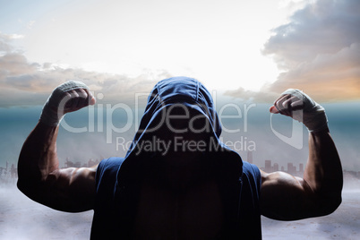 Composite image of athlete in hood flexing muscles