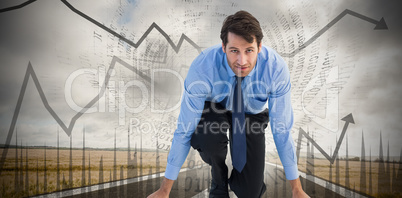 Composite image of focused businessman ready to race