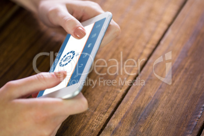 Composite image of woman using smartphone Composite image of woman using smartphone