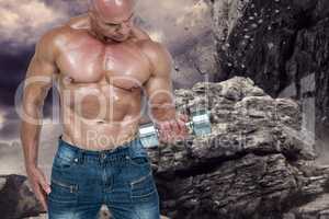 Composite image of bald man lifting dumbbells