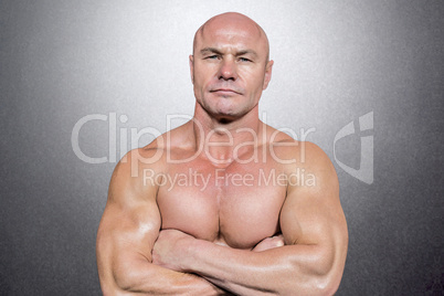Composite image of portrait of man with arms crossed