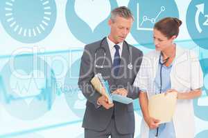 Composite image of male and female doctors discussing over repor
