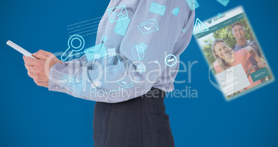 Composite image of businesswoman using her tablet