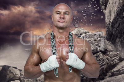 Composite image of portrait of confident bodybuilder holding cha