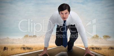 Composite image of tradesman in sprinting position