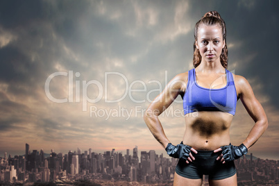 Composite image of portrait of confident fit woman