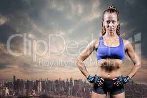 Composite image of portrait of confident fit woman