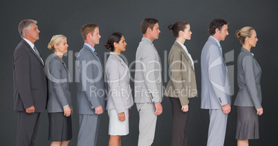 Composite image of business team standing in row