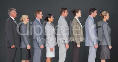 Composite image of business team standing in row