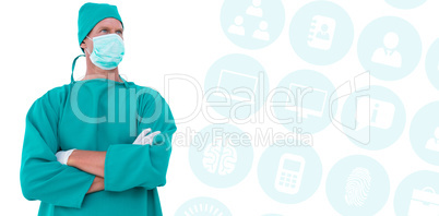 Composite image of surgeon standing arms crossed looking away