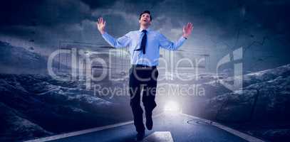Composite image of happy businessman running with hands up