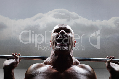 Composite image of healthy man lifting crossfit