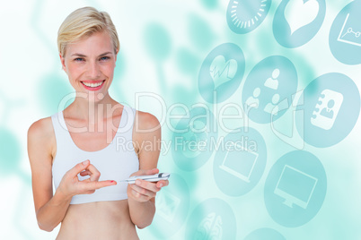 Composite image of attractive blonde woman doing test with blood