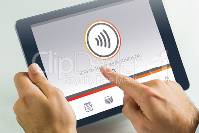 Composite image of man using tablet pc Composite image of man using tablet pc