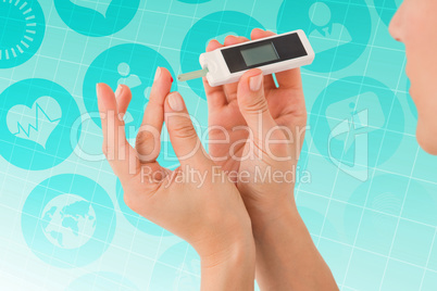 Composite image of diabetic woman using blood glucose monitor