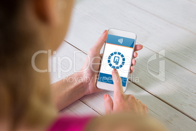 Composite image of woman using her smartphone