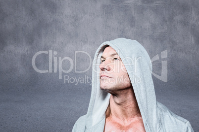 Composite image of thoughtful man looking up