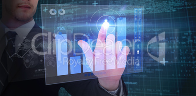 Composite image of focused businessman pointing with his finger