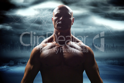Composite image of portrait of bodybuilder