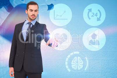 Composite image of cheerful businessman pointing at camera