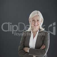 Composite image of portrait of happy businesswoman with arms cro