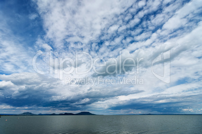 Beautiful lamb clouds above the lake