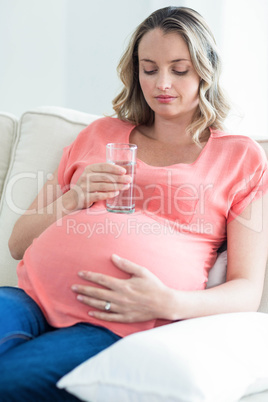 Pregnant woman drinking water