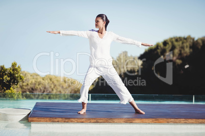 Calm brunette doing yoga