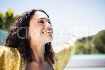 Happy brunette with arms overstretched Happy brunette with arms overstretched