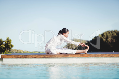 Calm brunette doing yoga