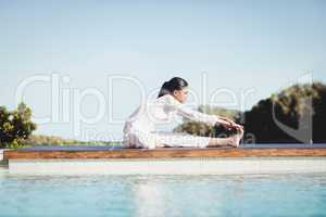 Calm brunette doing yoga