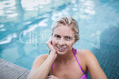 Fit woman resting on the edge