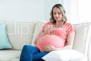 Pregnant woman drinking water