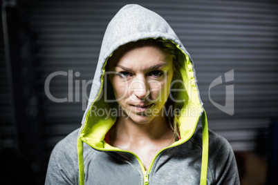 Portrait of woman wearing hood