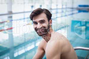 Handsome man smiling at camera