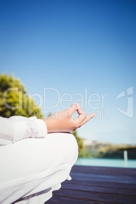 Calm brunette doing yoga