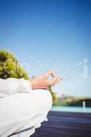 Calm brunette doing yoga