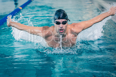 Fit man swimming