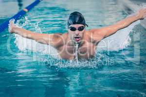 Fit man swimming