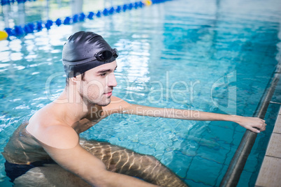 Concentrated man in the pool