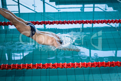 Fit man diving