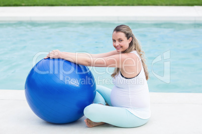 Pregnant woman with exercise ball