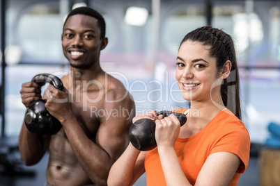 Athletic man and woman working out