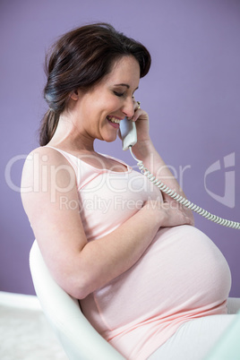 Pregnant woman on the phone