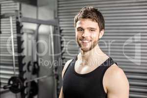 Smiling fit man posing