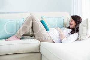 Pregnant woman reading a book